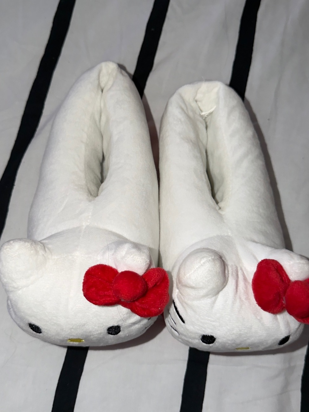 Hello Kitty White Plush Slip-On Slippers with Red Bow Accents
